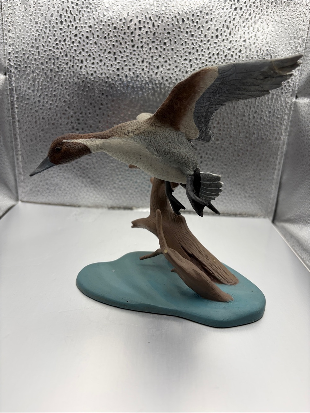 Vintage molded resin pintail duck figurine. Wing repaired